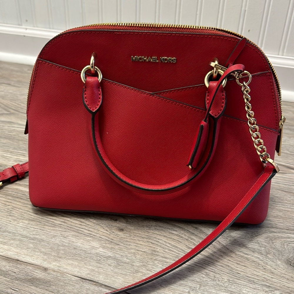 Michael Kors red crossbody or hand held